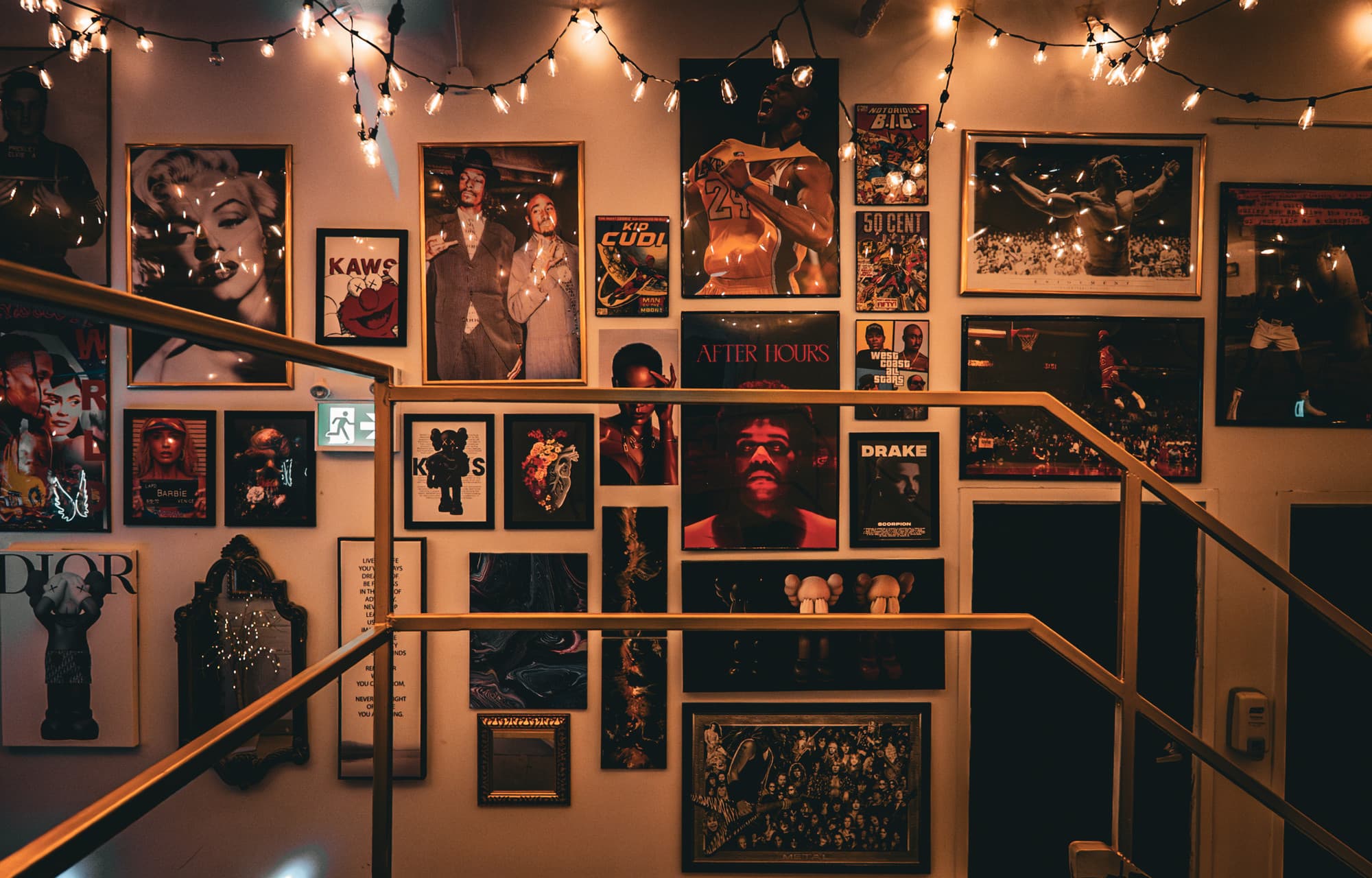 The 777 Lobby at Lush Event Space — gallery wall of legendary icons